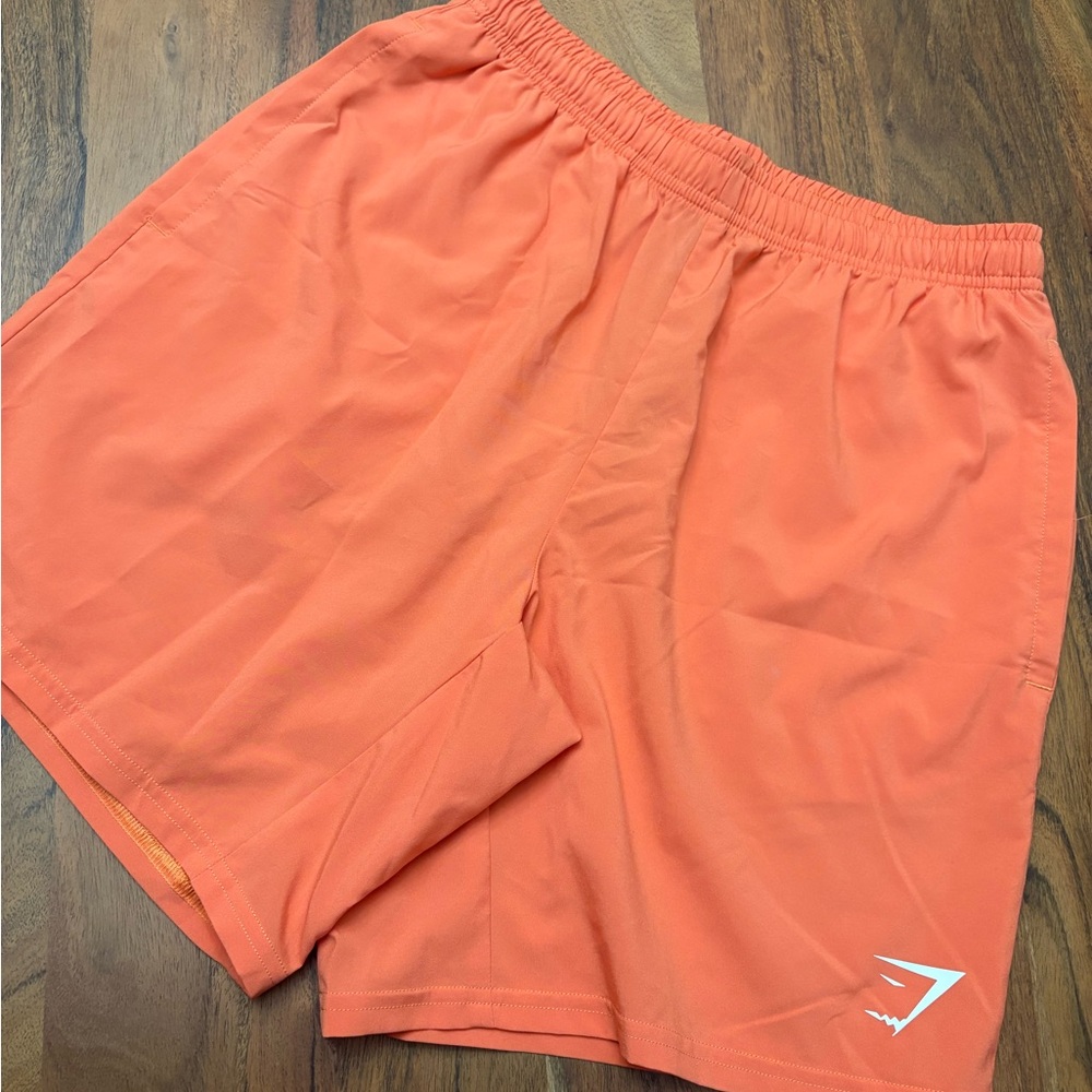 Gymshark Men's Arrival 7 inch Orange Shorts